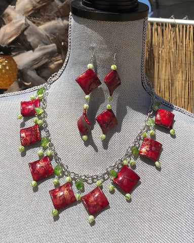 Tiki inspired Red Ceramic marbleized flat beads with green round glass beads and crystal matching earring set.