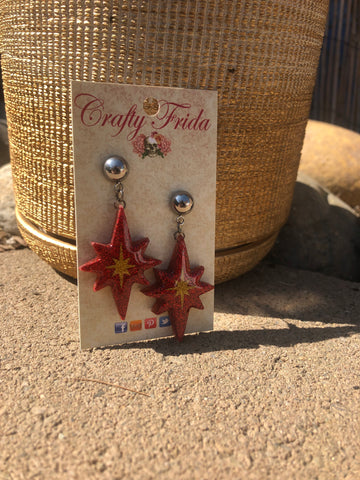 Kandy apple red Starburst dangles with gold starburst detail and stainless steel post